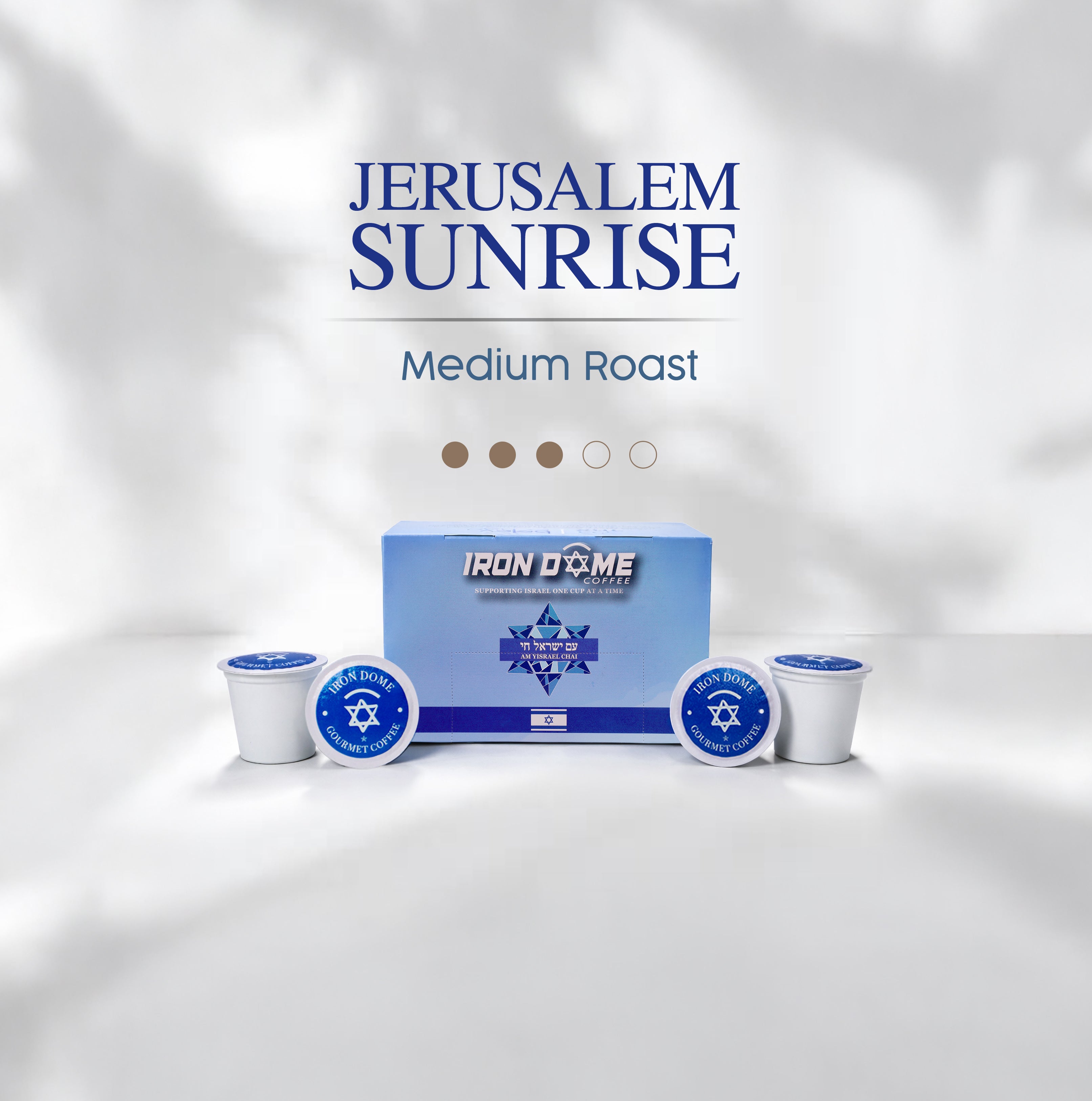 Jerusalem Sunrise coffee pods with Iron Dome branding on a white background