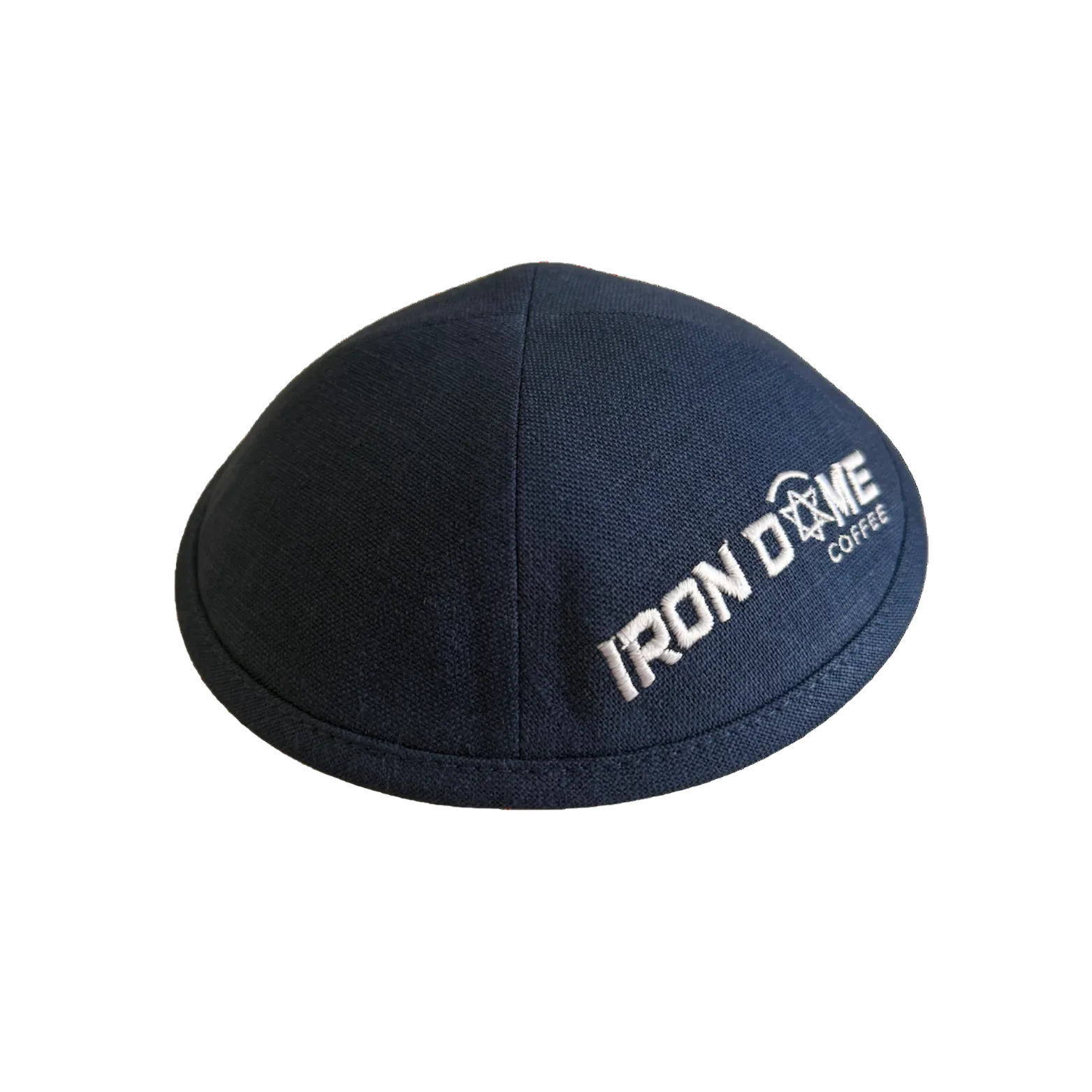 A navy blue premium fabric yarmulke with the 'Iron Dome Coffee' logo embossed on it.
