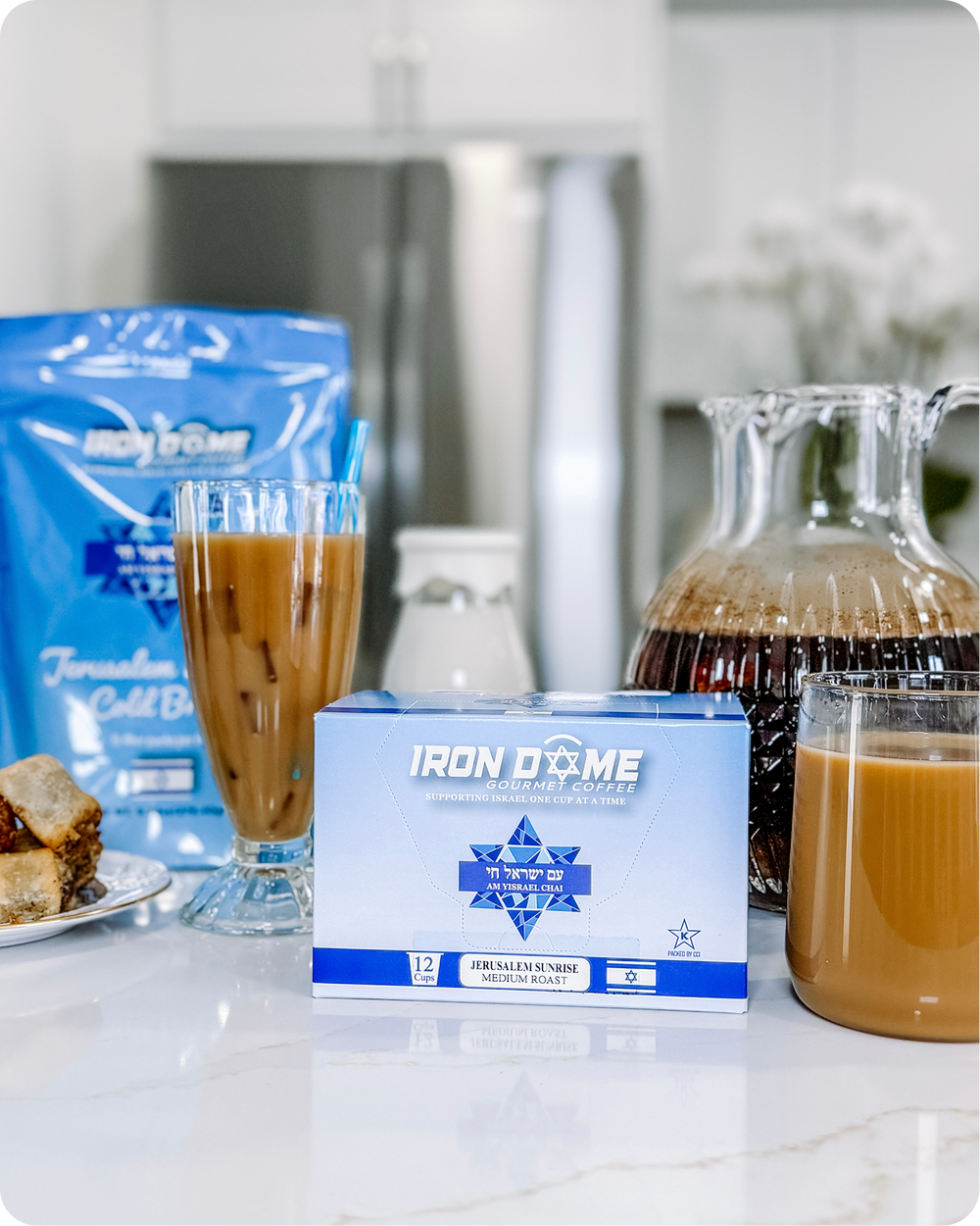iron dome product next to iced coffee
