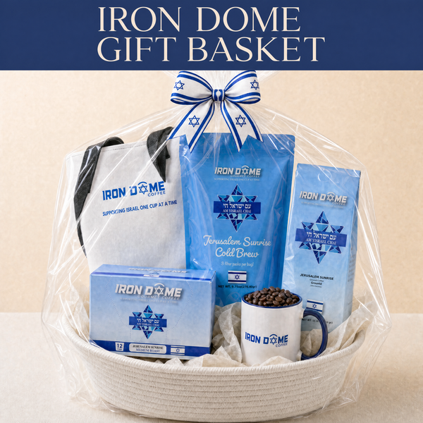 Iron Dome Coffee gift basket with coffee, K-Cup pods, cold brew, a mug of coffee beans, and blue-and-white gift wrapping.