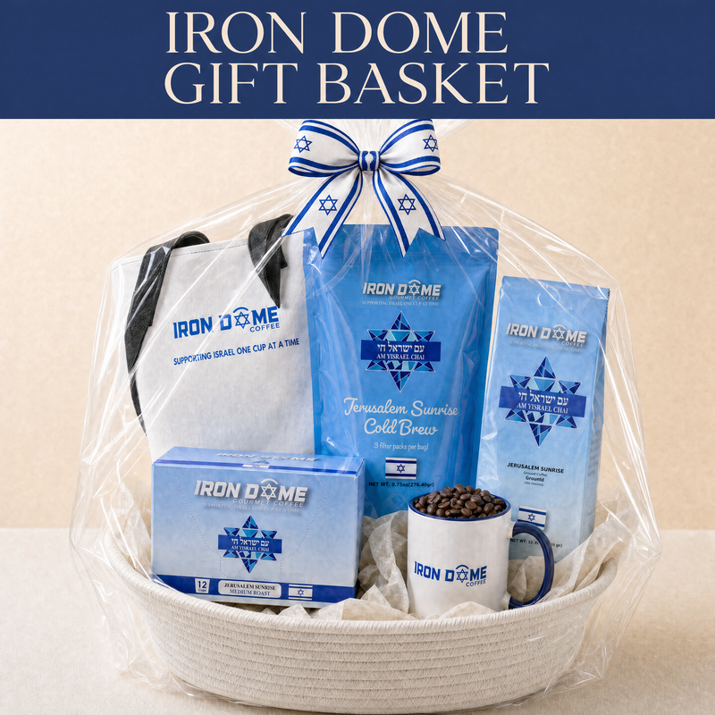 Iron Dome Coffee gift basket with coffee, K-Cup pods, cold brew, a mug of coffee beans, and blue-and-white gift wrapping.