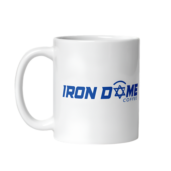 A white ceramic coffee mug with the text 'IRON DOME COFFEE' printed in blue.